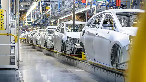 Batch on cars being built in a factory